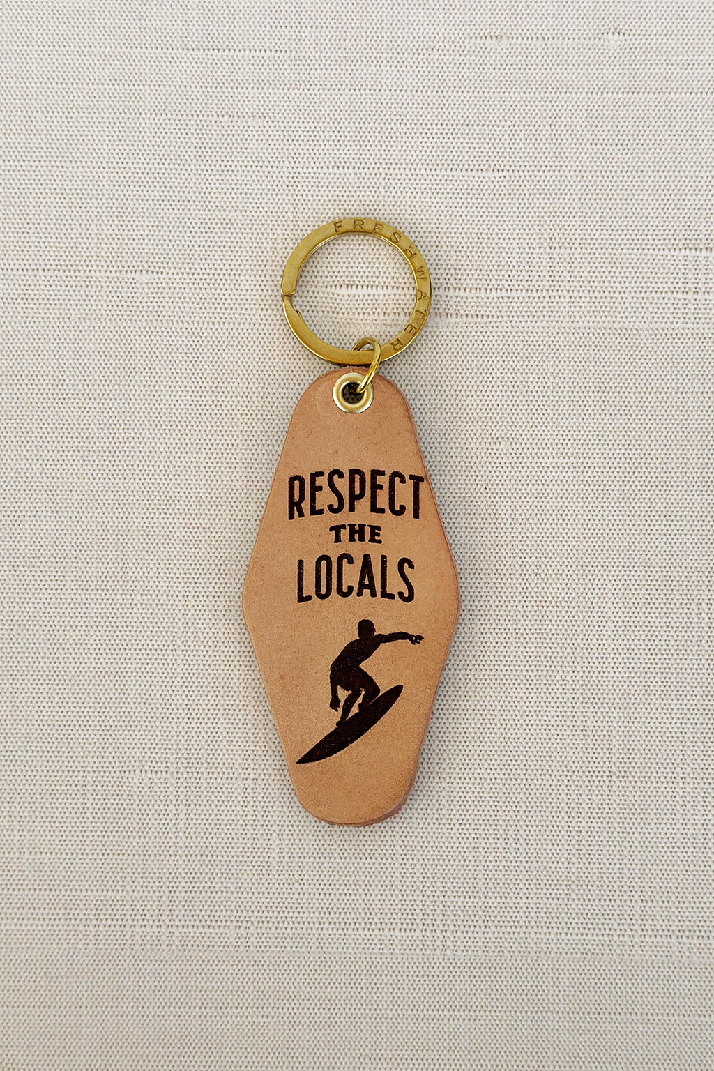 Respect The Locals Hotel Keychain